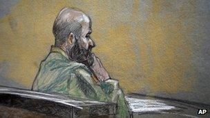 In this courtroom sketch, U.S. Army Major Nidal Malik Hasan is shown during closing arguments of his court martial, 22 August 2013