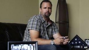 Retired US Army Staff Sgt Shawn Manning poses for a photo, at his home in Lacey, Washington 3 August 2013