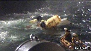 RNLI volunteers retrieved helicopter wreckage