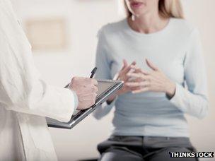 Woman talking to a doctor