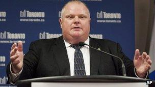 Toronto Mayor Rob Ford answers questions about the three new staffers he has hired at a news conference at city hall in Toronto on 31 May 2013