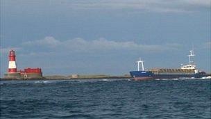 The Danio aground next to the Longstone lighthouse