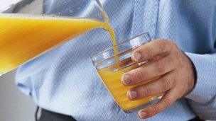 Pouring orange juice