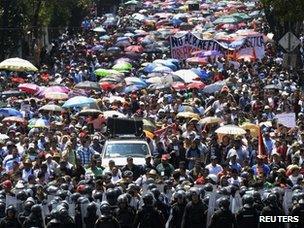 Protesters march through Mexico City September 1, 2013