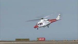 Search and Rescue helicopter taking off after refuelling at Jersey Airport