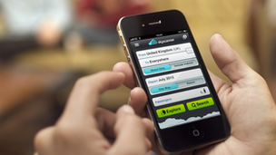 Smartphone with Skyscanner app