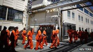 Inmates walk in San Quentin state prison in San Quentin, California 8 June 2012