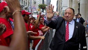 New York Republican mayoral candidate John Catsimatidis greets supporters before a television debate in New York 28 August 2013