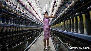 A woman in a Chinese textile factory