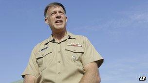 Rear Adm. Sean Buck speaks to the press at Naval Station Norfolk in Virginia on 11 September 2013