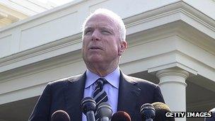 US Senator John McCain and Senator Lindsey Graham ollowing their meeting with US President Barack Obama at the White House in Washington, DC 2 September 2013