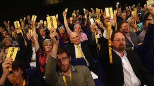 Delegates vote at the Lib Dem conference in Glasgow