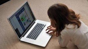 Generic girl using a computer