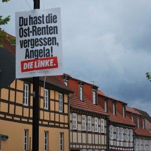 An election poster in Templin accuses Angela Merkel of forgetting pensions for eastern Germany