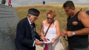 Joe Williams with visitors at Beachy Head Bomber Command Tribute