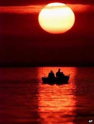 Fishing boat at sunset (Image: AP)