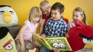 Children reading Angry Birds Playground book