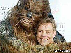 Actor Mark Hamill, who played Luke Skywalker in the original Star Wars trilogy with Chewbacca