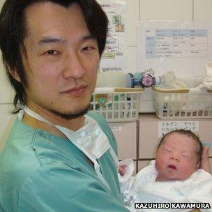 Kazuhiro Kawamura and newborn baby