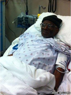 Herman Wallace in a hospital bed