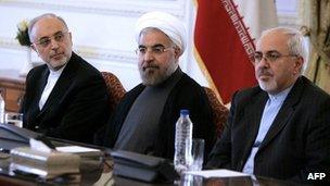 Ali Akbar Salehi (l); Hassan Rouhani centre; and Foreign Minister Javad Zarif