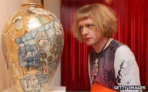 Grayson Perry with his artwork Urn for the Living