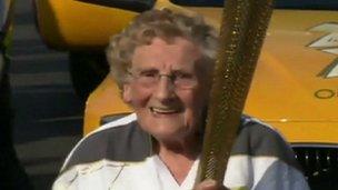 Jean Bishop holding the Olympic torch