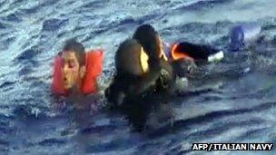 Italian Navy video grab of survivors being rescued. 12 Oct 2013