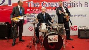 Boris Johnson playing the drums