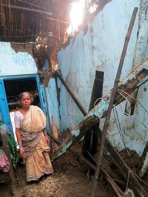 Lakhmi Behra in her damaged home