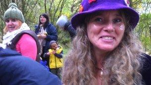 Judy Paul in bright purple hat