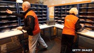 TNT workers in a sorting office