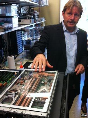 IBM's Bruno Michel with liquid cooled Aquasar server