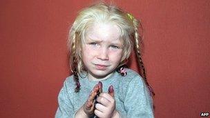 Handout photo released by Greek Police on October 18, 2013 shows an unidentified 4-year-old blonde girl whom was found on October 17, 2013 near Farsala in central Greece