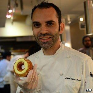 Dominique Ansel with a cronut