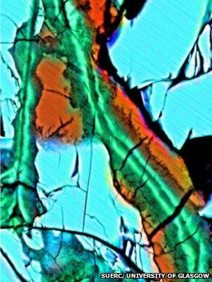 False colour microscopic image of Lafayette meteorite showing evidence of carbonation, with siderite (orange) replacing olivine (blue).