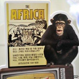 A 'This Africa' cigarette ad with a monkey