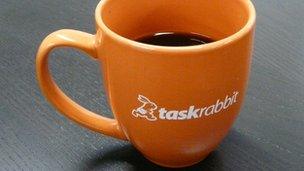 Taskrabbit logo on coffee cup