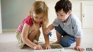 A boy and girl playing