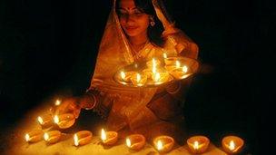 Diwali candles being lit