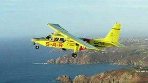 The Lion's Pride aircraft over the coast of Guernsey