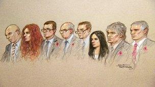 Court sketch showing the eight hacking defendants