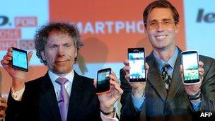 Lenovo executives showing off new phones