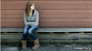 Teenage girl on bench