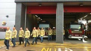 Firefighters walk out in Adam Street, Cardiff