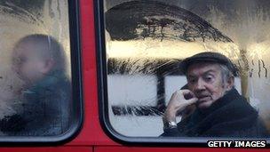 A elderly man on a London bus