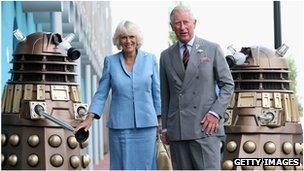 The Prince of Wales and Duchess of Cornwall and two Daleks