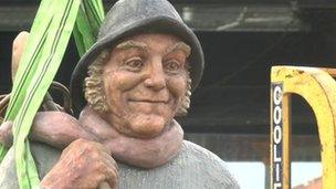 Jolly Fisherman sculpture