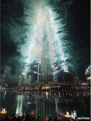 Fireworks are seen as people celebrate after Dubai won the right to host the 2020 World Expo, in front of the Burj Khalifa in Dubai November 27, 2013