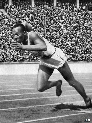 A file picture taken on 5 August 1936 shows US champion Jesse Owens powering his way at the start of the 200m event which he won